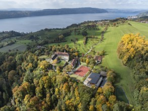 Aerial view of Lake Constance, Überlinger See, surrounded by autumn vegetation with Spetzgart