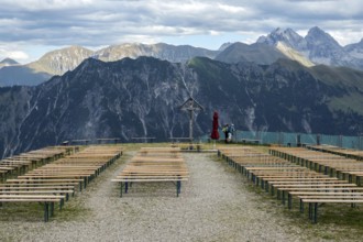 Seating and cruez for mountain service at Schlappoldsee station of the Fellhorn cable car, in the