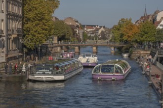 Tourist boat docks on the Ill and transports visitors who enjoy the view of Strasbourg's sights and