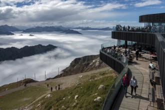 Restaurant at the Nebelhorn summit with views of the Allgäu Alps, mountains rising from fog in the