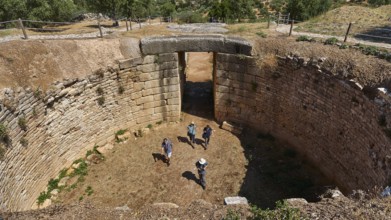 Group of visitors, Mycenaean dome tomb, archaeological site, UNESCO World Heritage Site, Mycenae,