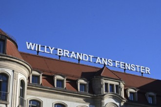 Willy Brandt lettering on the window at the hotel where Brandt visited during GDR times and showed