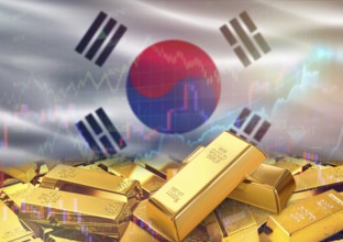 Gold bars on South Korea flag in background. Gold bars stacked on South Korean flag. Concept of