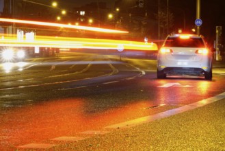 Road traffic at night and poor visibility in a city, autumn, Germany