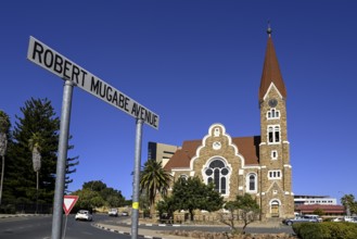 Robert Mugabe Avenue sign in front of the 1910 Evangelical Lutheran Christ Church, Windhoek, Khomas