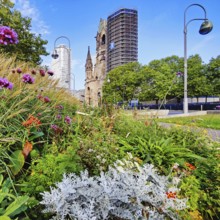 Planted middle strip of Tauentzienstraße with Kaiser Wilhelm Memorial Church, promenade,