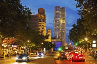 Budapester Straße with Kaiser Wilhelm Memorial Church and Upper West Tower in the evening,