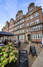 Restaurant and historic brick building in Peterstraße, Komponistenviertel, Neustadt, Hamburg,