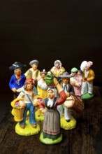 Colorful Provençal terracotta figurines represent traditional characters from rural life. Each