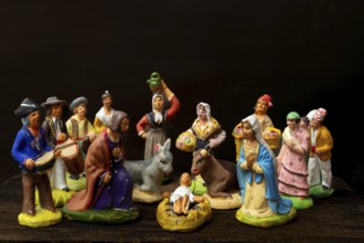 Traditional Provençal terracotta Santons figurines displayed for a crib in France showcasing local