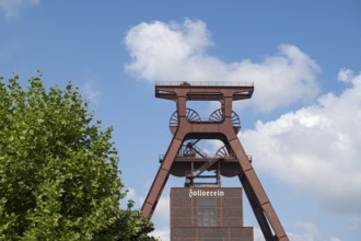 Double trestle headframe in front of a blue sky, Shaft XII, Zollverein Coal Mine Industrial
