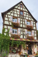 Decorated half-timbered house in the old town centre of Kaysersberg