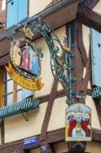 Guild sign of a restaurant in the old town centre of Ribeauvillè