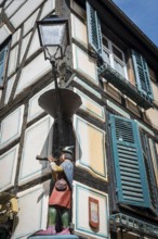 The flute player, half-timbered house in the historic centre of Ribeauvillè