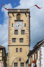 Tower with clock in the old town centre of Ribeauvillè