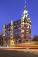 Speicherstadt town hall in Hamburg's Speicherstadt warehouse district at blue hour with traces of