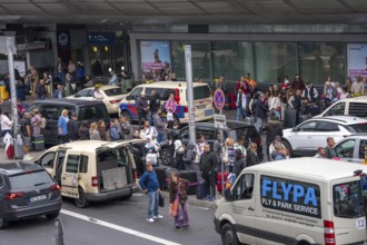 Ahead of Terminal B, many thousands of people set off on holiday on the first day of the North