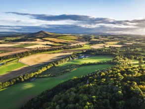 Fields and Farms over River Teviot and Minto Crags from a drone, Roxburghshire, Scottish Borders,