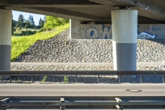 Concrete bridge with graffito in Münsingen on the Swabian Alb, Baden-Württemberg, Germany, for