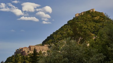 Byzantine castle of Mystras, on a wooded hill under a sky with decorative clouds, Mystras, Mistra,
