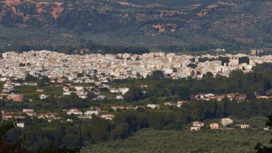 Panorama of a sprawling city in the middle of a green landscape under a blue sky, Sparta, Mystras,