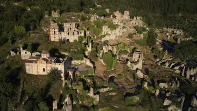 Ancient ruins spread over a hilly landscape with abundant greenery, Mystras, Mistra, UNESCO World