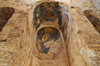 Church of Agia Sophia from the 14th century AD, Ancient frescoes on a wall depicting religious