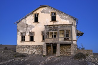 Dilapidated building in the desert sand, blue hour, Kolmanskop, near Lüderitz, Karas region,
