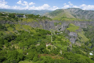Sweeping view of gorge with scattered houses and lush greenery, Garni Gorge, Azat River, Kotayk