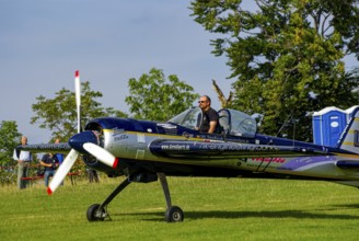 A Jakovlev Jak-55 with the registration LY-AGL during a flight demonstration as part of an air show