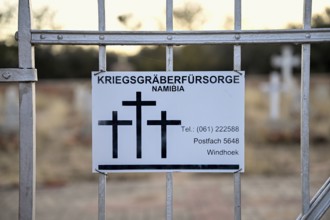 Namibia War Graves Commission sign at the entrance gate to the German military cemetery at