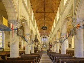 Church of Saint Martin decorated with flags and fishing nets, Yport, Département Seine-Maritime,