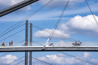 Bridges in Düsseldorf, in the foreground, the pedestrian and cycle bridge over the canal to the