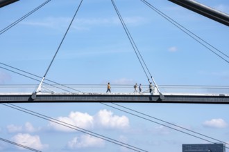 Bridges in Düsseldorf, in the foreground, the pedestrian and cycle bridge over the canal to the