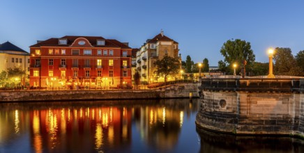 Night shot of a residential building on the Spreeuferpromenade, Berlin, Germany