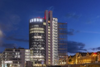 Building in the evening. Landesbank Baden-Württemberg on Heilbronner Straße. The bank's logo on the