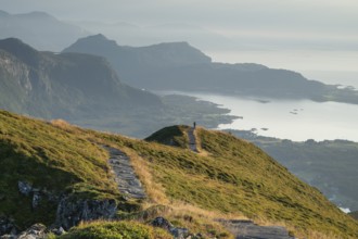 Hikers on Rørsethornet stone staircase, with 3292 steps one of the longest continuous stone