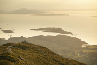 Cairns and view over islands and sea, evening mood, Rørsethornet stone staircase, with 3292 steps