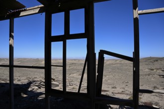 View from a dilapidated building into the desert, Pomona, restricted diamond area, near Lüderitz,