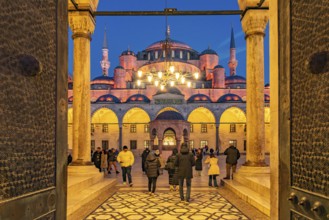 Inner courtyard of the Blue Mosque or Sultan Ahmed Mosque at dusk, Istanbul, Turkey