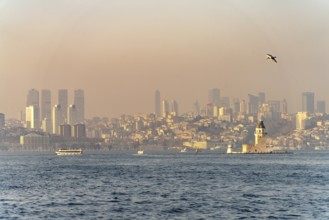 The Maiden Tower lighthouse, Leander Tower or Maiden Tower in front of the skyline of Istanbul,