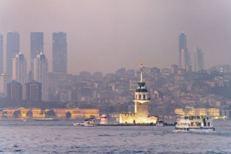 The Maiden Tower lighthouse, Leander Tower or Maiden Tower in front of the Istanbul skyline at