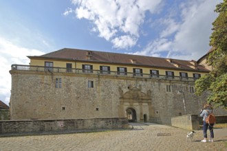 Portal and entrance with tourist taking a photo, castle gate, Hohentübingen Castle, Tübingen,