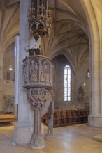 Gothic pulpit from 1509 with decorations and pulpit bonnet, sounding board, work of art, interior