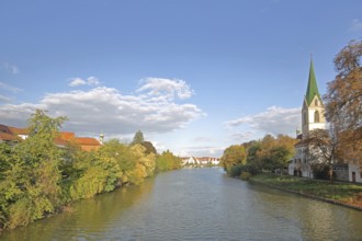 Collegiate church of St. Moriz built 14th century on the Neckar in autumn, Neckar riverbank,