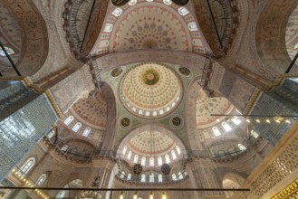 Interior and domes of the New Mosque Yeni Camii in Istanbul, Turkey