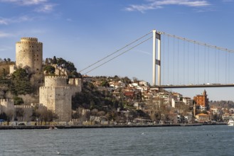 The Rumeli Hisari Fortress and the Fatih Sultan Mehmet Bridge over the Bosphorus in Istanbul,