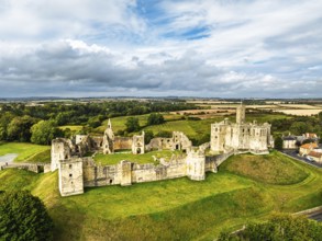 Warkworth Castle over River Coquet from a drone, Warkworth, Northumberland, England, United Kingdom