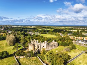 Ruins of Dirleton Castle & Gardens from a drone, Dirleton, East Lothian, Scotland, UK