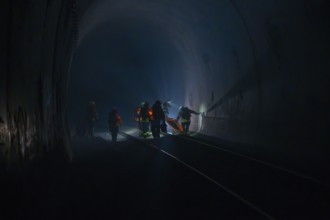 Fire brigade operation in a dark tunnel in dim light, fire brigade exercise in the new construction